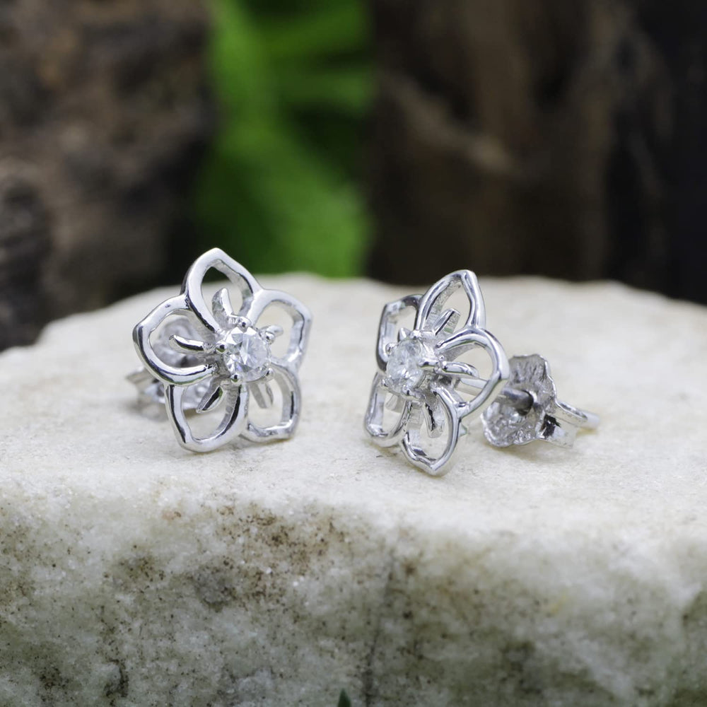 
                      
                        1/10 Carat Lab Created Moissanite Diamond Push Back Flower Stud Earrings In 925 Sterling Silver (0.10 Cttw)
                      
                    