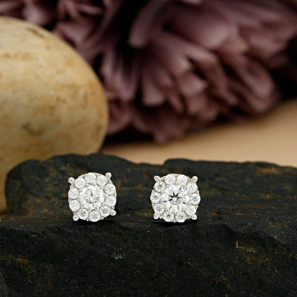 
                      
                        Round Cut Lab Created Moissanite Diamond Push Back Halo Stud Earrings In 925 Sterling Silver (1 To 2 Cttw)
                      
                    