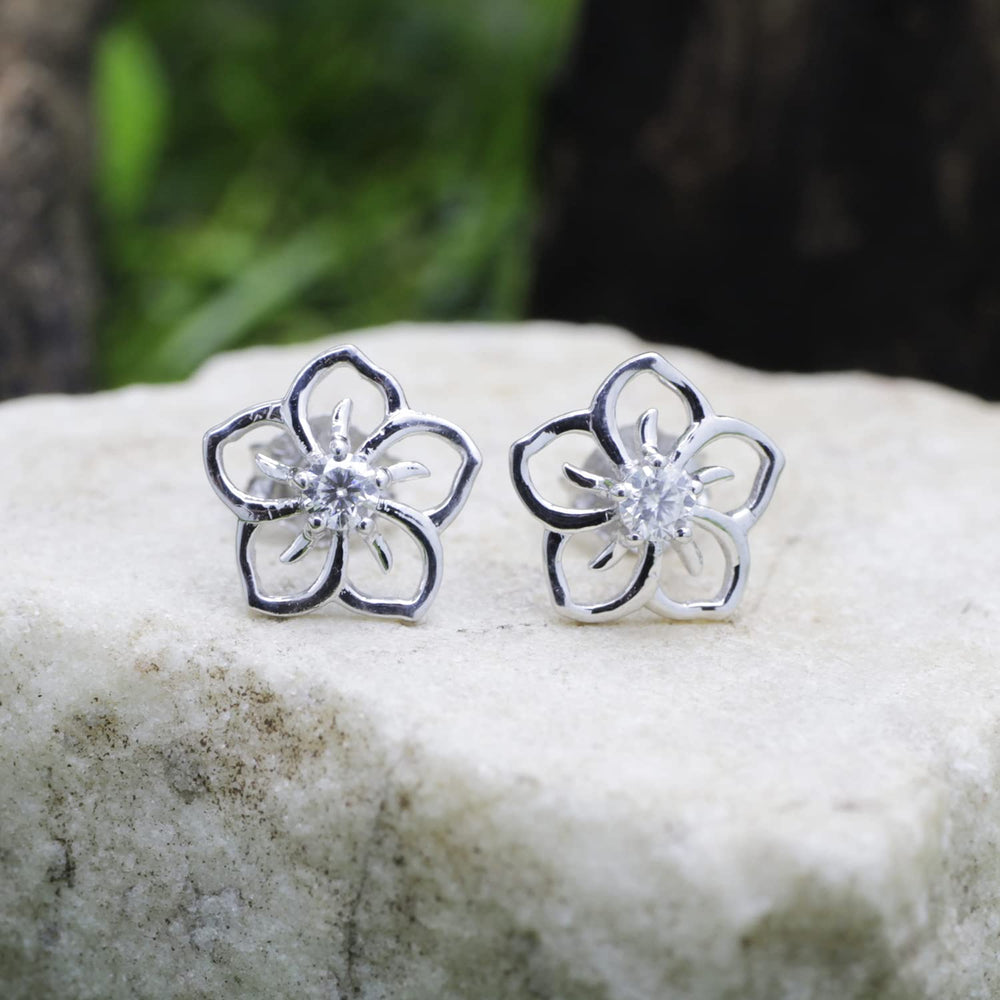 
                      
                        1/10 Carat Lab Created Moissanite Diamond Push Back Flower Stud Earrings In 925 Sterling Silver (0.10 Cttw)
                      
                    