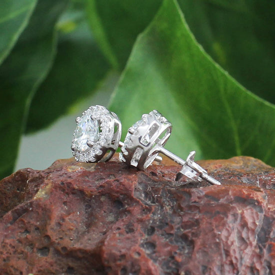 1 Carat Center Stone 5MM Round Cut Lab Created Moissanite Diamond Push Back Halo Stud Earrings In 925 Sterling Silver (1 Cttw)