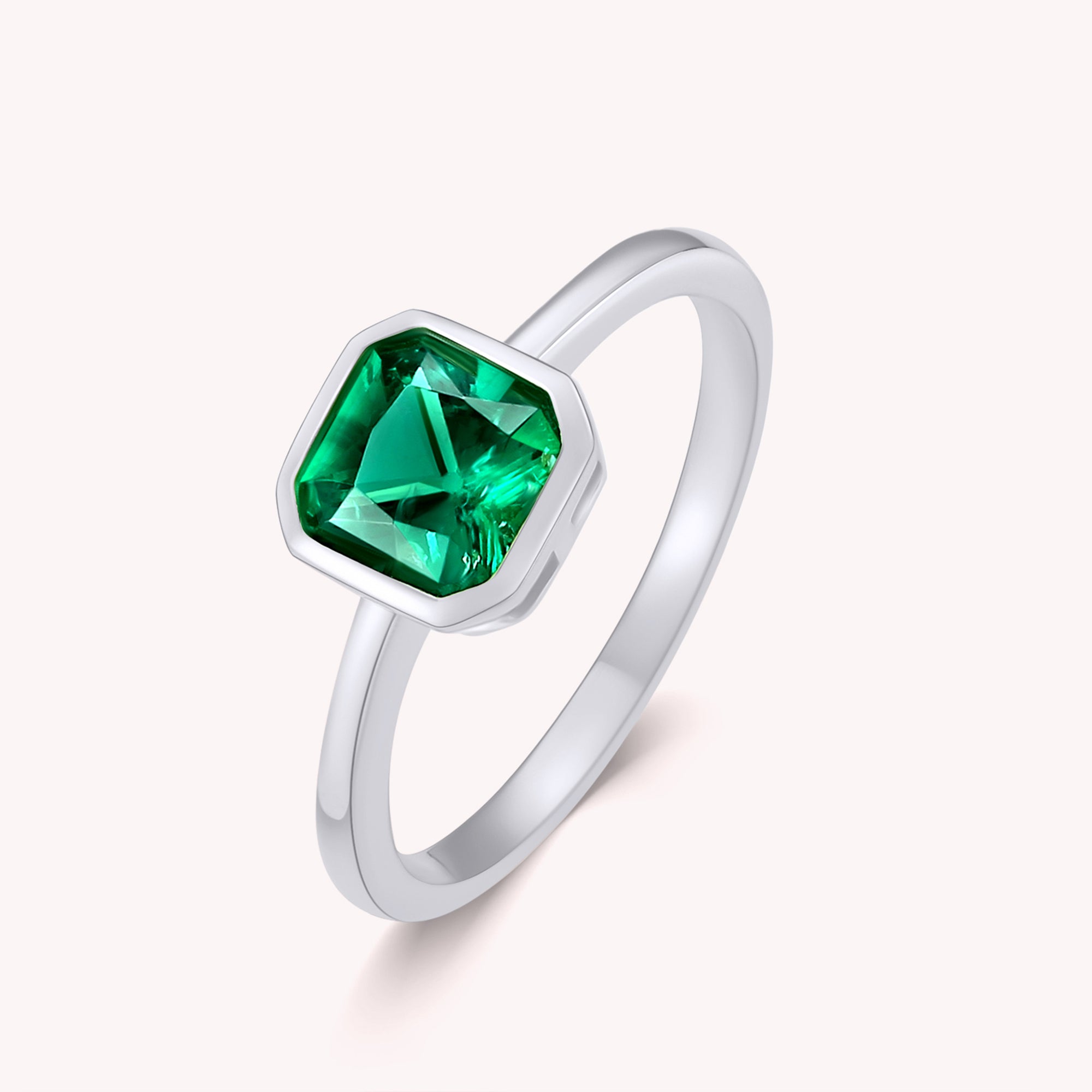 Era Emerald Solitaire Engagement Ring