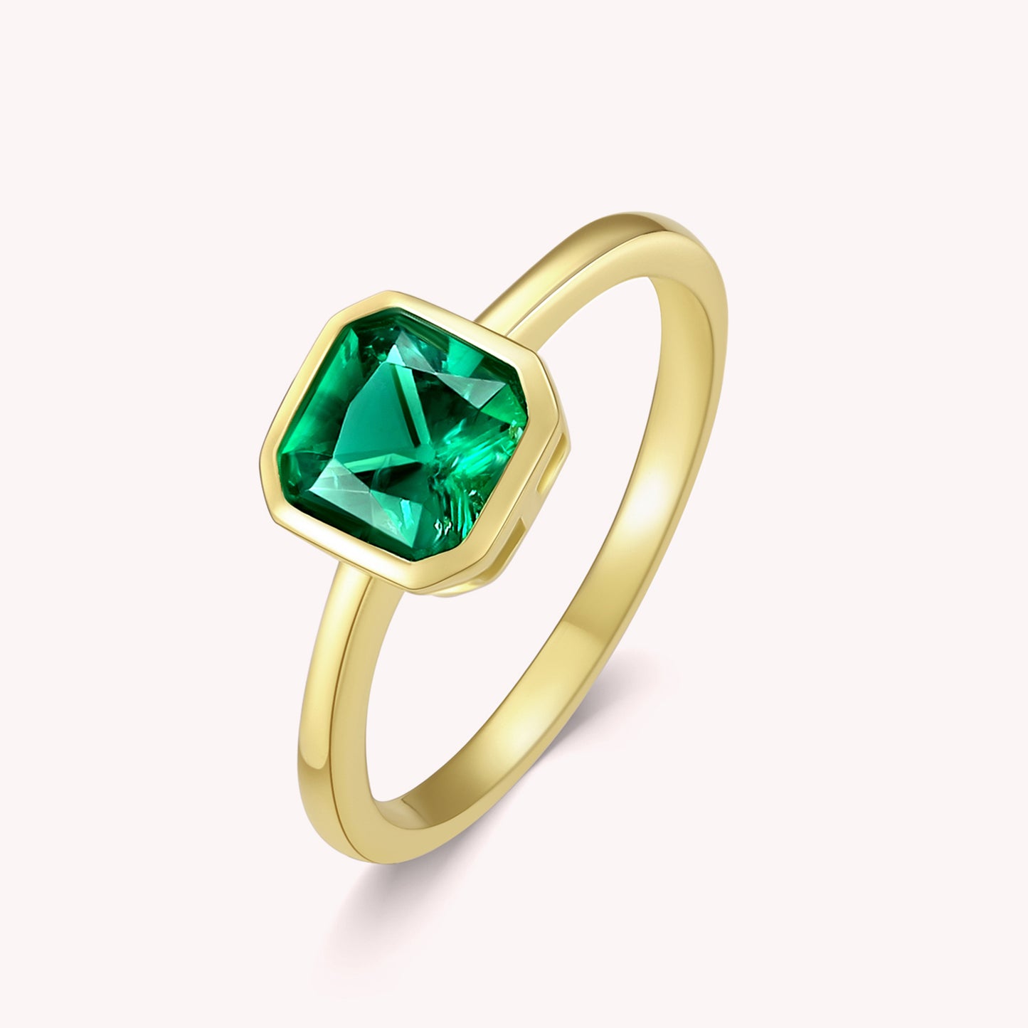 Era Emerald Solitaire Engagement Ring