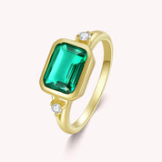 May Emerald Solitaire Engagement Ring