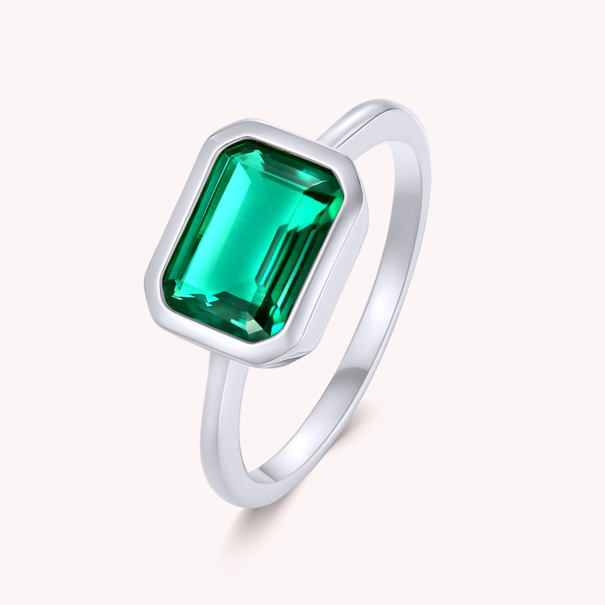 Kit Emerald Solitaire Engagement Ring