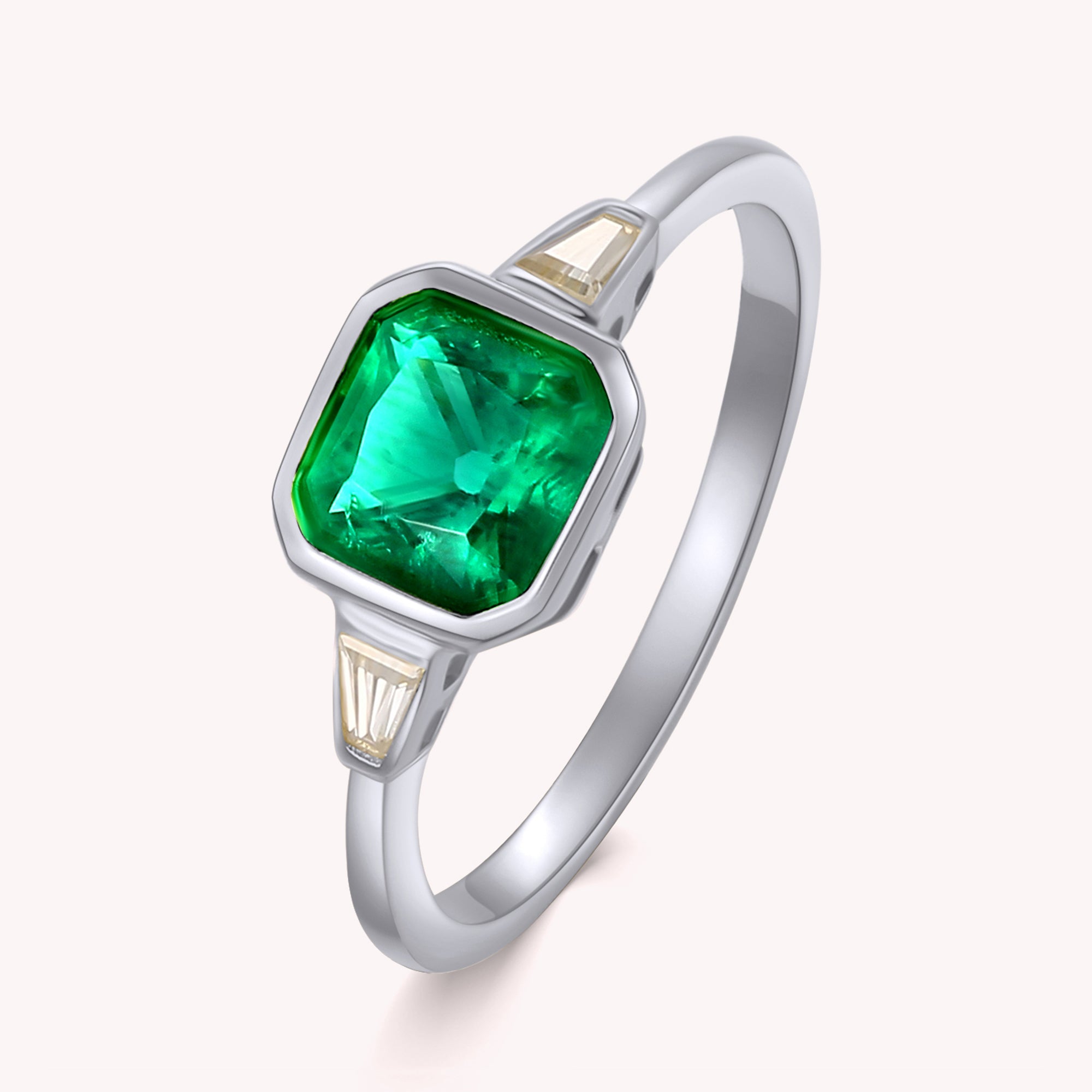 Sol Three Stone Emerald Engagement Ring