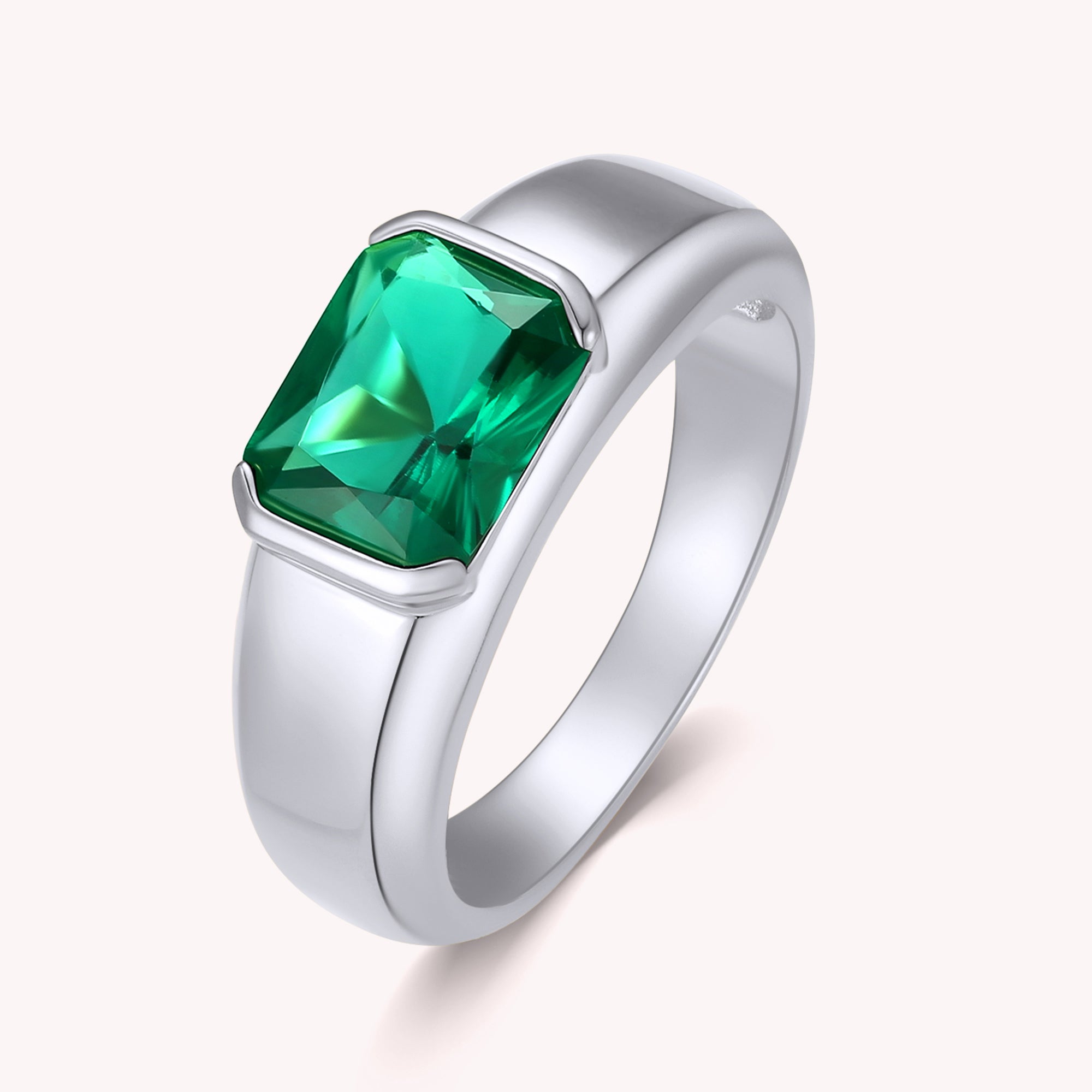 Isa Emerald Solitaire Engagement Ring