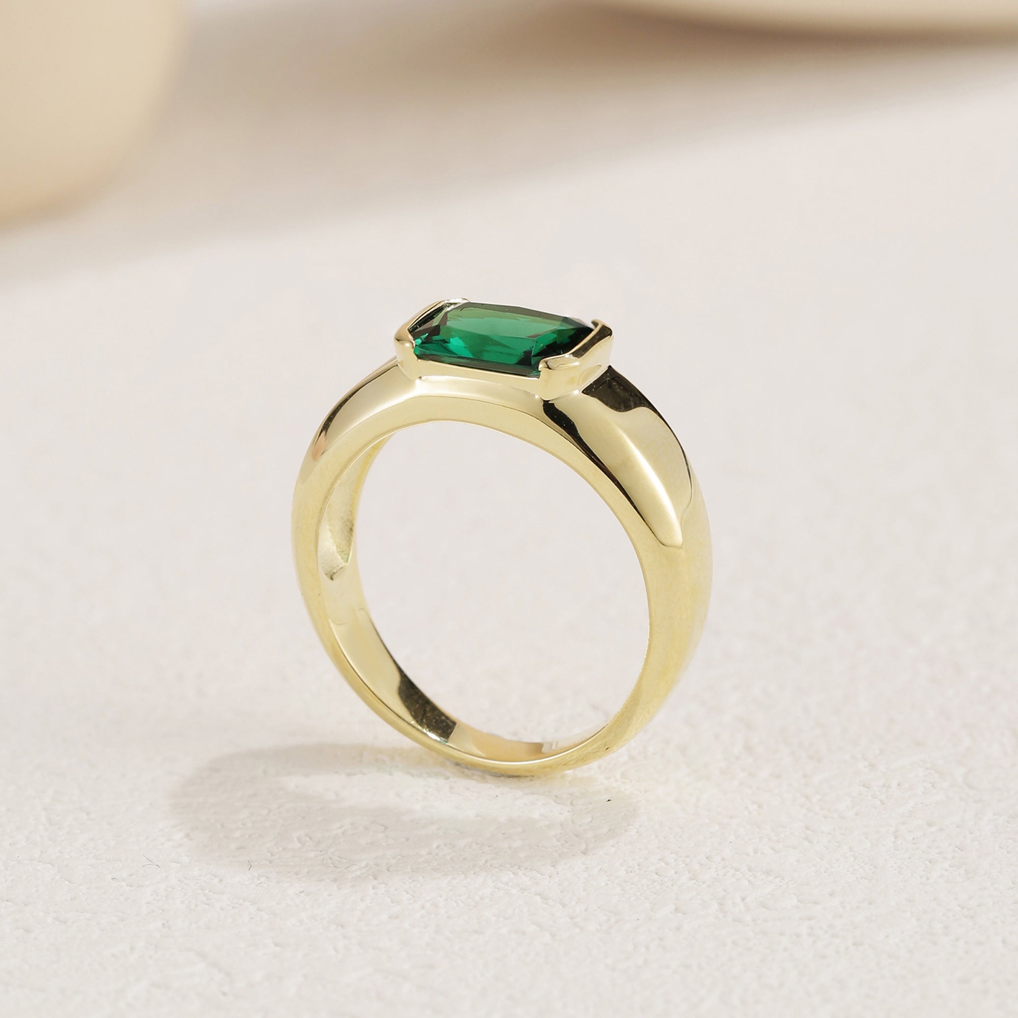 Isa Emerald Solitaire Engagement Ring