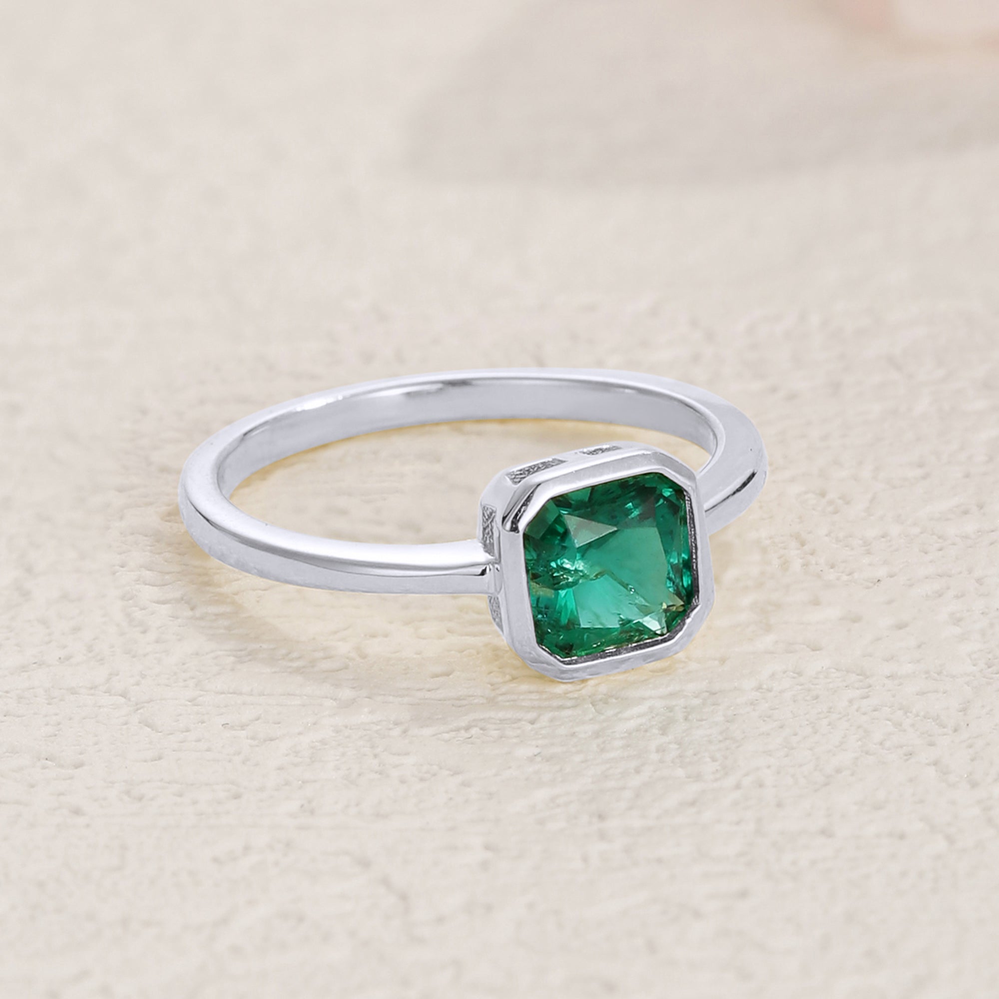 Era Emerald Solitaire Engagement Ring