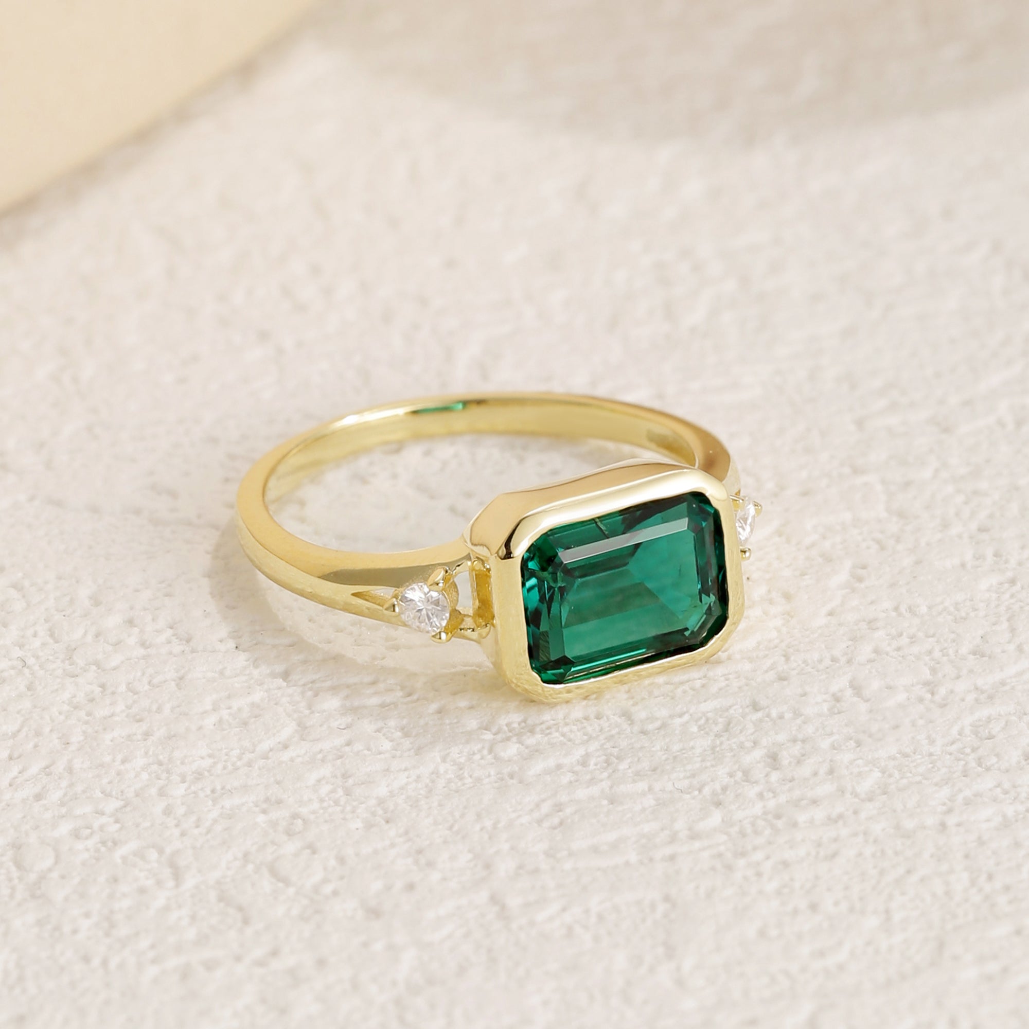 May Emerald Solitaire Engagement Ring