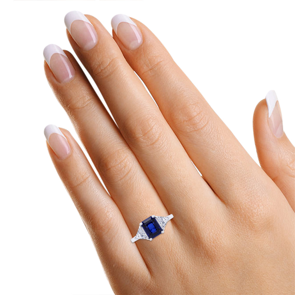 
                      
                        14k Gold Plated 925 Sterling Silver Emerald Cut Blue Sapphire With Trillion White Topaz Ring for Women Statement Jewelry Gift For Her
                      
                    