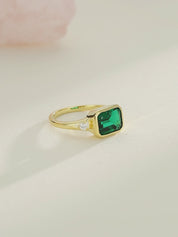 May Emerald Solitaire Engagement Ring