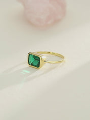 Kit Emerald Solitaire Engagement Ring