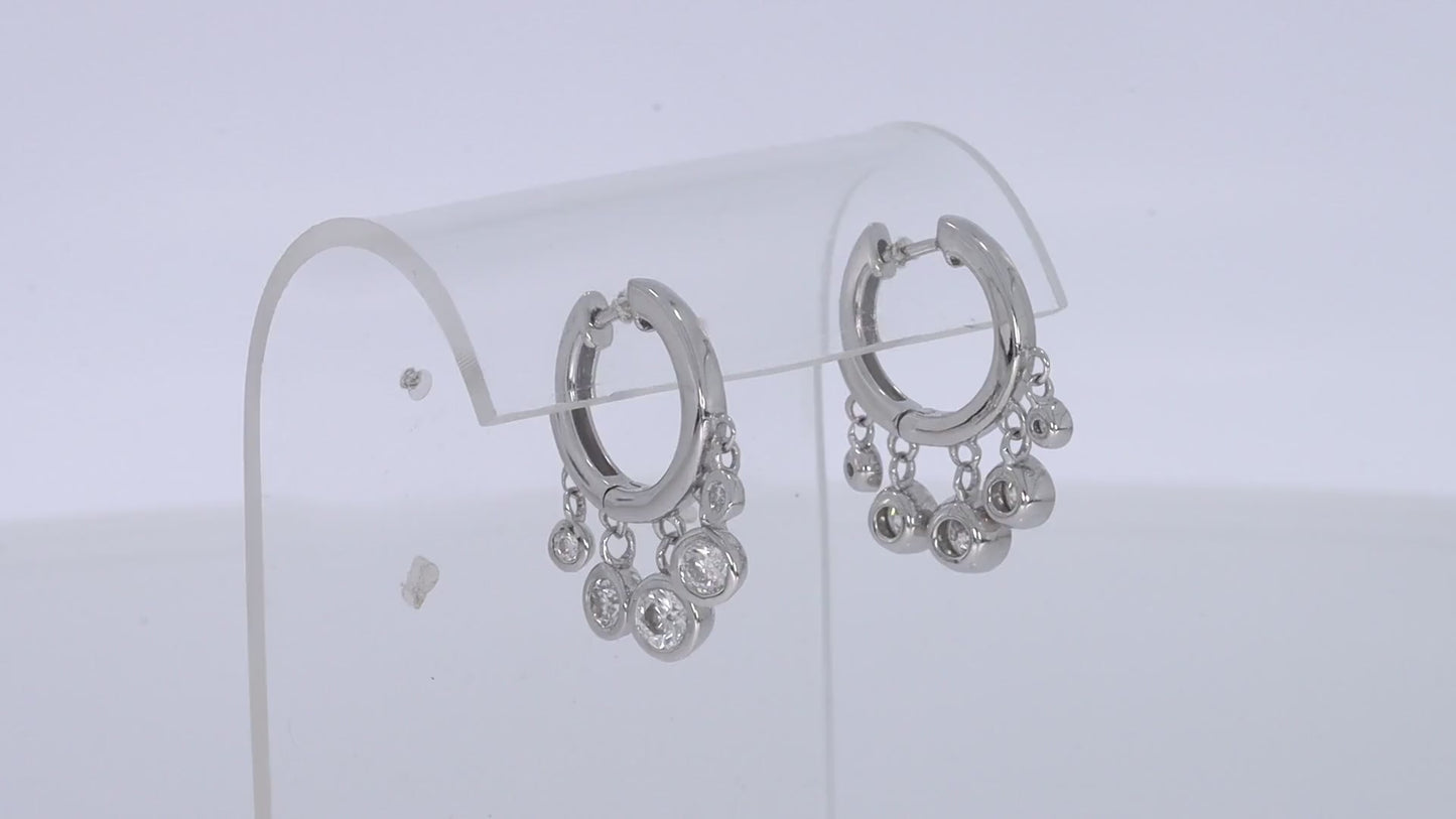 Load and play video in Gallery viewer, 1.29 Carat Center Stone 4MM Round Cut Lab Created Moissanite Diamond Hoop Earrings In 925 Sterling Silver (1.29 Cttw)
