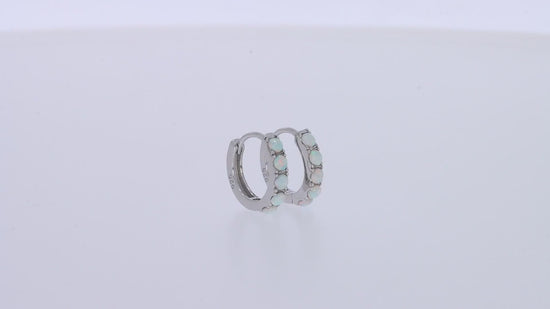 Load and play video in Gallery viewer, Round Cut Created Opal Gemstone Huggie Hoop Earrings For Women In 925 Sterling Silver
