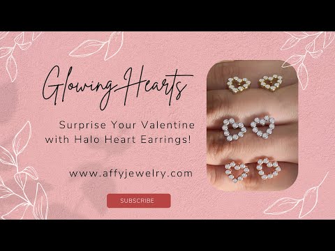 Load and play video in Gallery viewer, Round White Cubic Zirconia Bezel Set Open Heart Stud Earrings In 925 Sterling Silver
